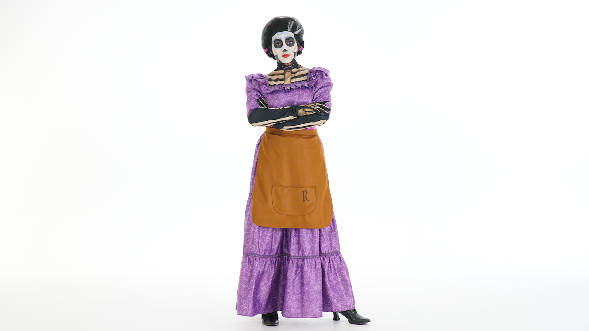 Dress in the Coco Women's Mama Imelda Costume and save Miguel and Hector this Halloween! Celebrate the Day of The Dead in the Coco Women's Mama Imelda Costume!
